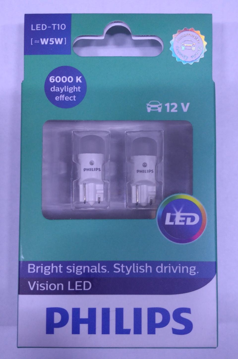 Заміна ламп головного світла (Philips H4 RacingVision +150% & Philips Vision LED) 4