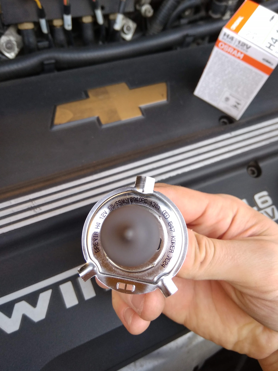 Заміна лампочок головного світла на Osram original H4 Bilux 2