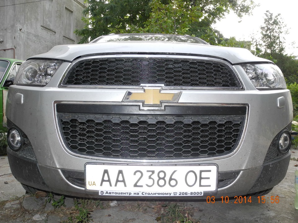 Встановив захисну сітку в бампер та решітку радіатора. 1
