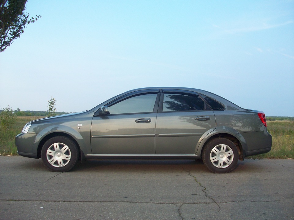 Тонування автомобіля та дефлектори бічних вікон Lacetti 1