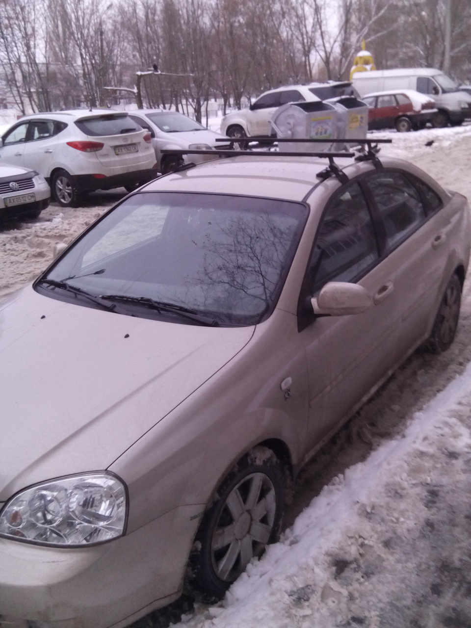 Багажник на Шевролі Лачетті (та інші автомобілі з гладким дахом - Ланос, авео та ін.) + докладна інструкція по встановленню 1