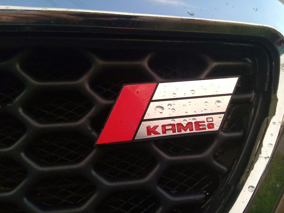 Шильдік Kamei 1