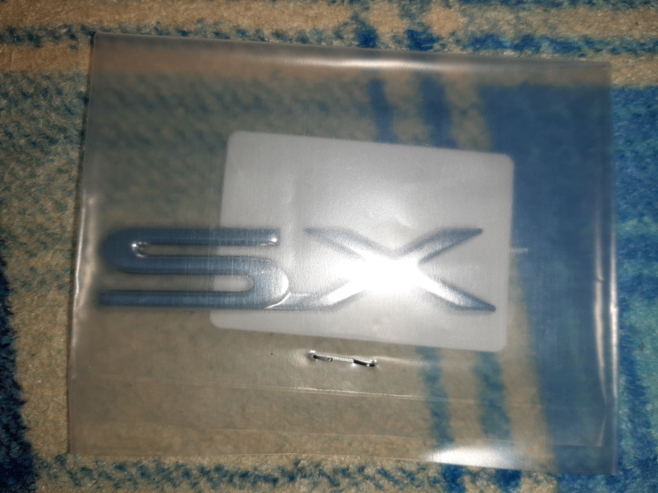 Прикупив емблеми SX 1