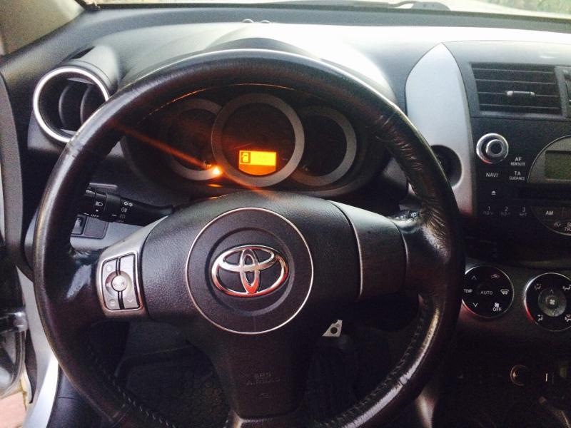 TOYOTA RAV4 окантовка кнопок управління магнітолою на кермі та кільце в кермо 1