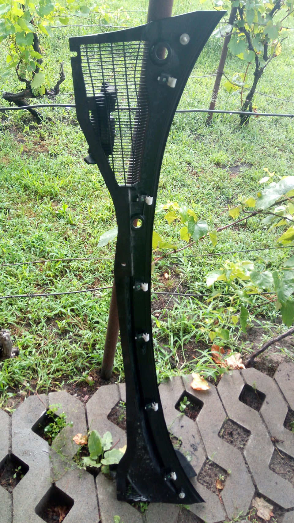 Cleaning windshield water tray 5