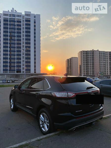 Lexus rx300 2017 темно-синій vs Ford Edge titanium 2016 чорний 1