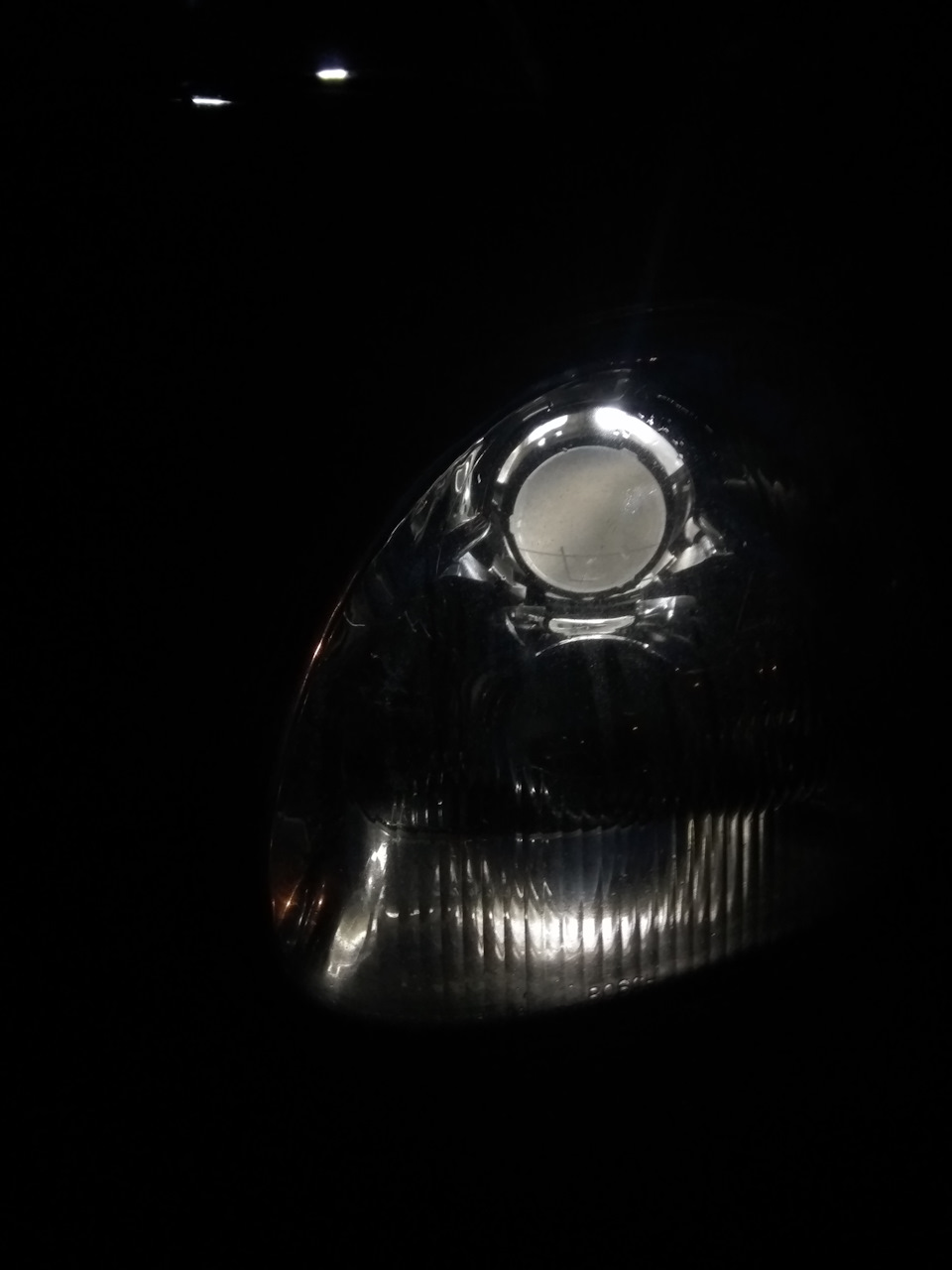 Учтановка білінз замість дольнього світла на Scorpio ll 5