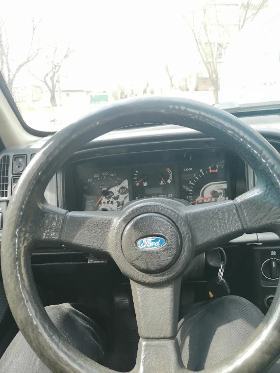 Руль RS, диски RIAL і custom панель приладів Ford Sierra