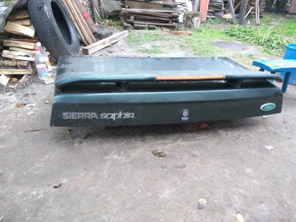 Купив кришку багажника під відкриття важелем із салону 1