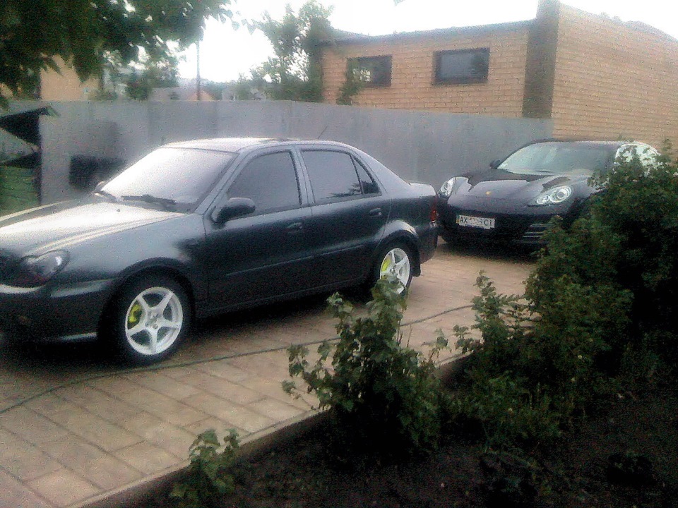 Geely and Porsche Panamera 4S 1
