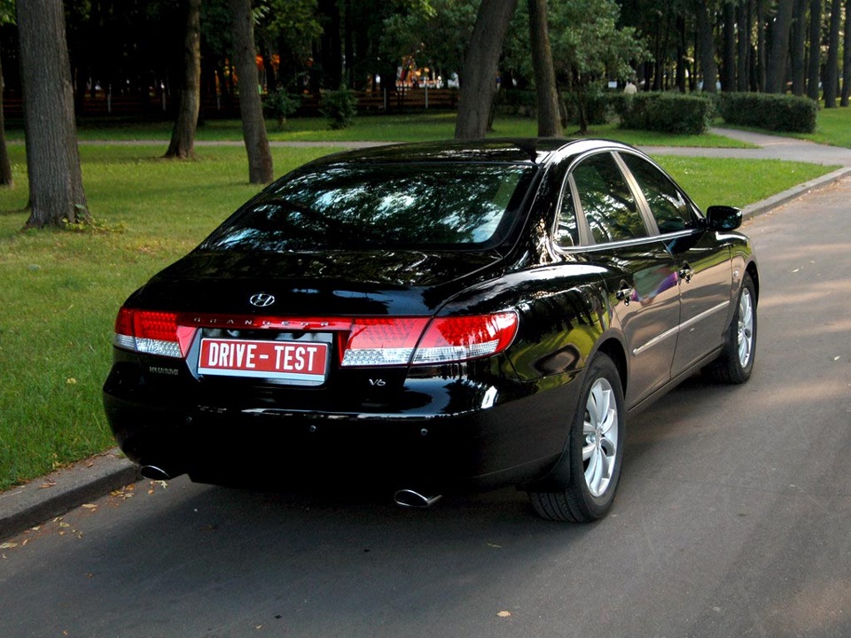 Hyundai Grandeur 2008 VS Kia Sportage 2014 5