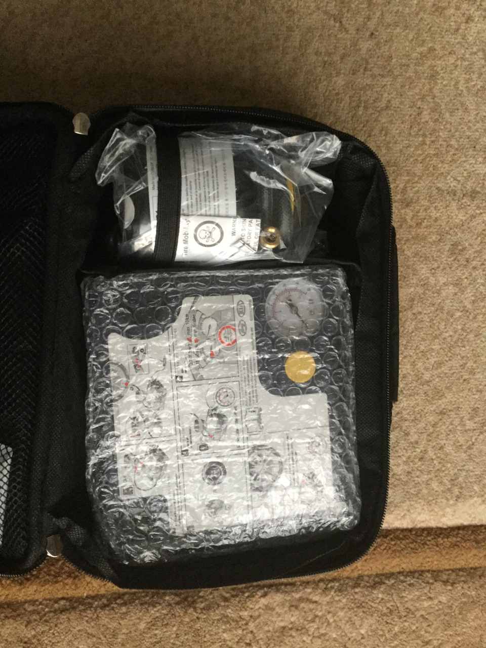 Tire mobility kit 2
