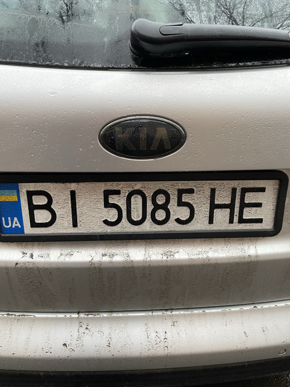 6) Тонування ліхтарів та емблеми KIA 2