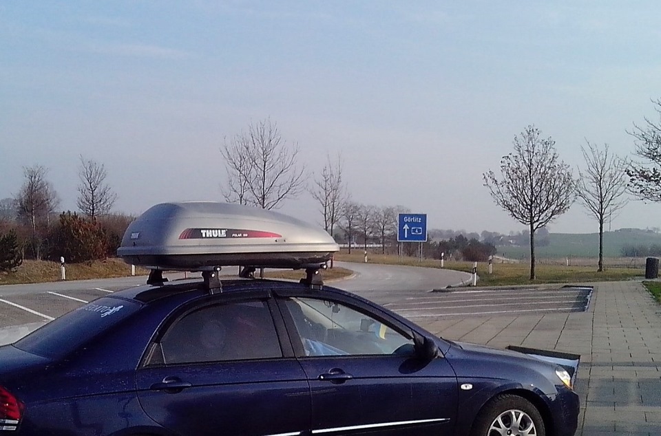 Багажник на даху Amos + багажний бокс Thule Polar 100 + відеореєстратор 4