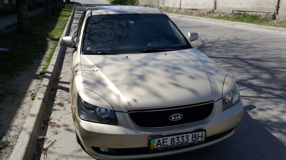 Накладки на фари війки для Маджентіса 1