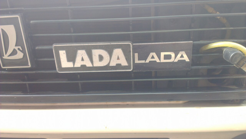 Шильдік Lada на грати 4