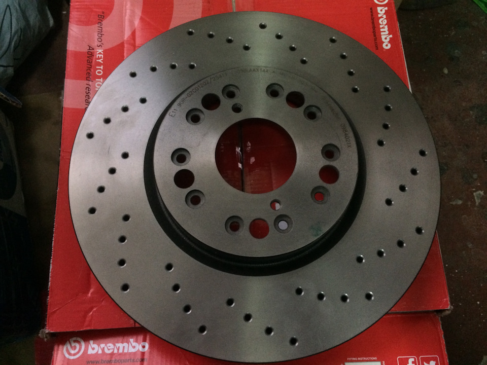 Передні перфоровані гальмівні диски Brembo Xtra-Line + Brembo колодки + літня гума і кришка радіатора 1
