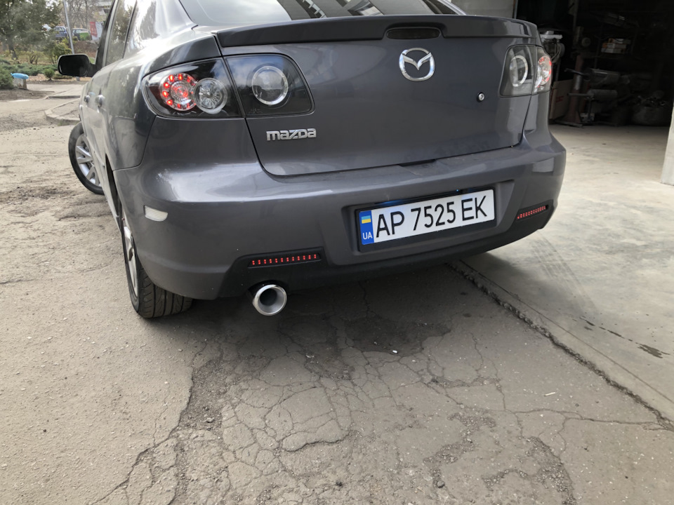 Насадка глушника Buzzer ZZ100X + Білі бічні катафоти в задній бампер 1