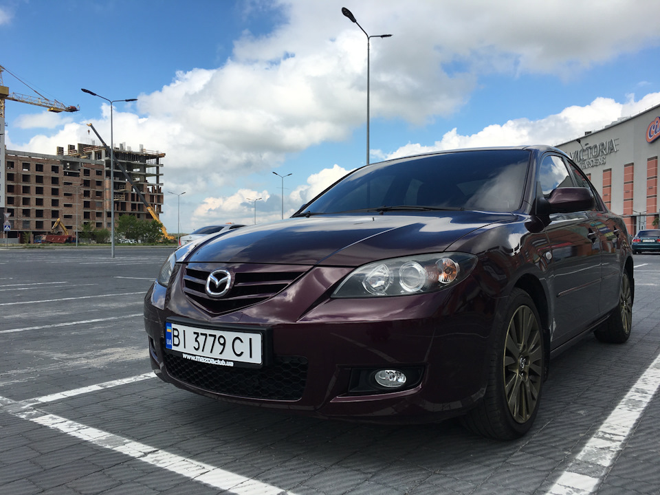 Лоб AGC + тонування + двірники Mazda 1