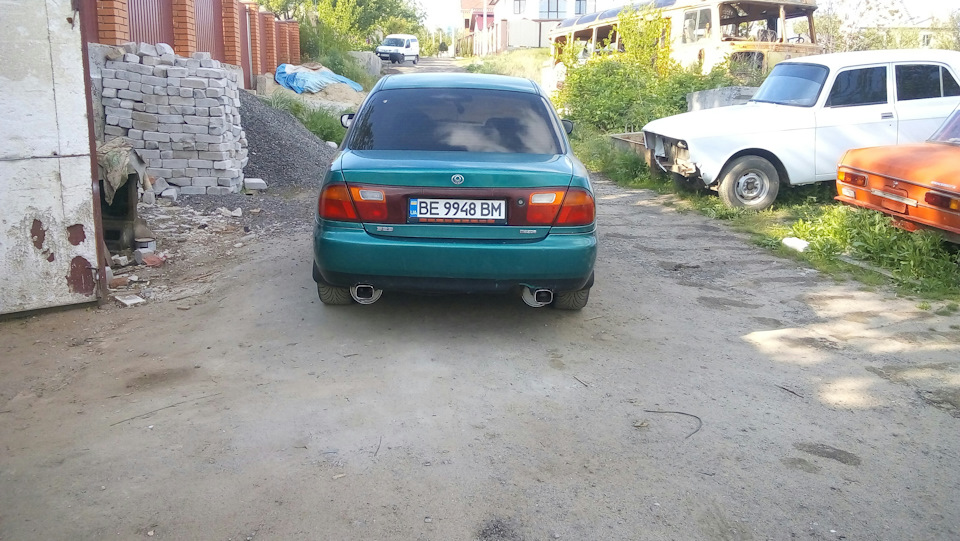 Подвійний вихлоп mazda 323 ba 1