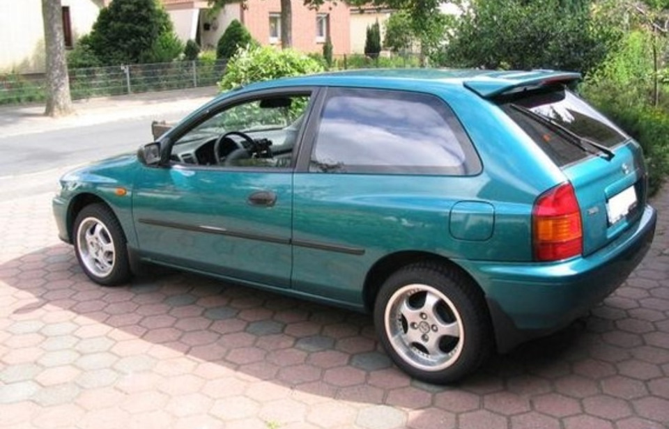 Купив спойлер mazda 323P 2