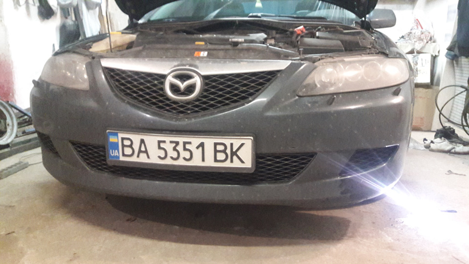 3 білінзи у фару Mazda 6gg 4