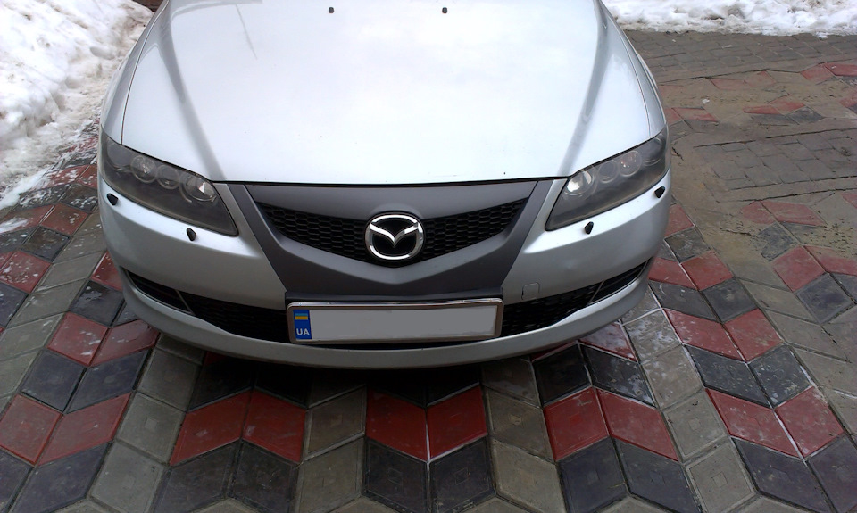 Емблема, значок Mazda 1