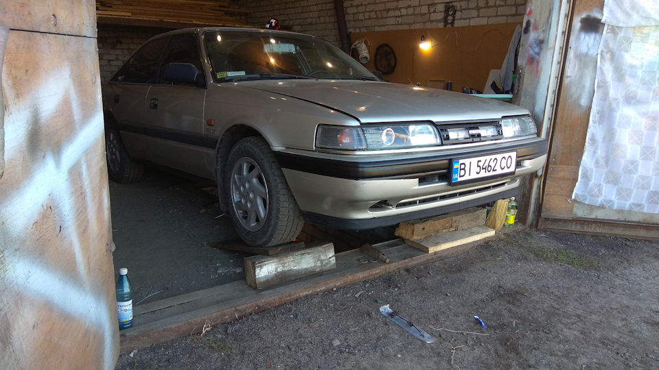 Mazda 626 gd (центральний трос ручного гальма) 2