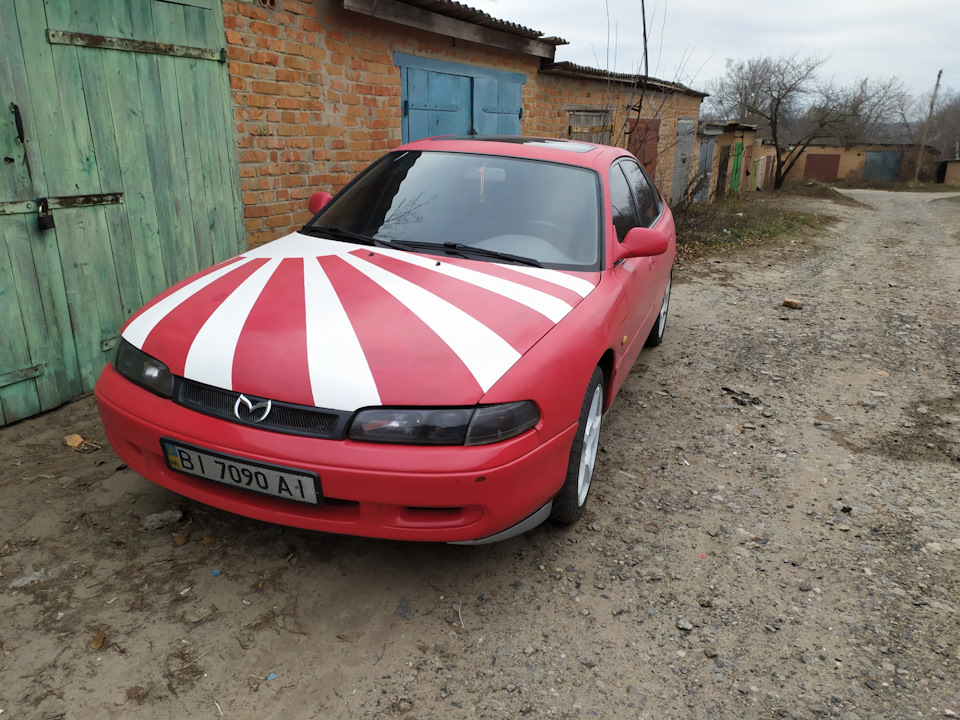 Бі лінзи в Мазду 626 ge 1