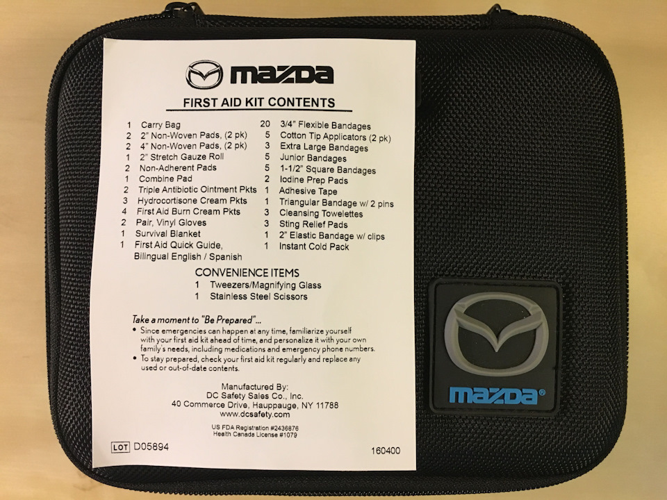 Оригінальна аптечка Mazda 4