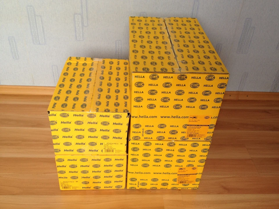 Нова оптика Hella W124