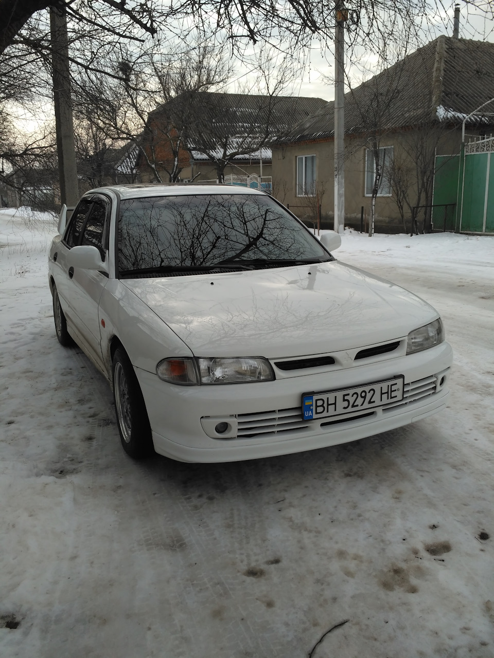 дефлектори вікон lancer v 92-95 рік 4