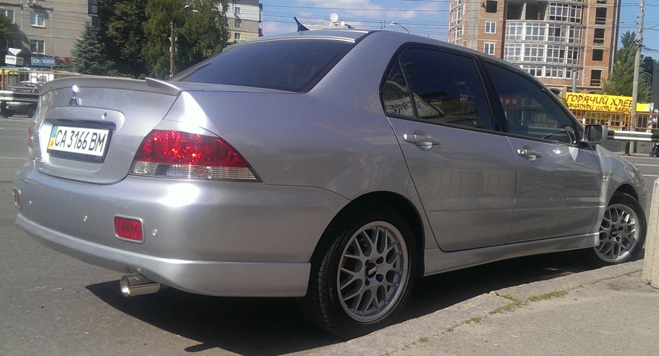 Накладка заднього бампера, оригінал Lancer 9 5