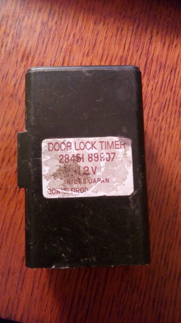 Подскажите где находится DOOR LOCK TIMER? 1