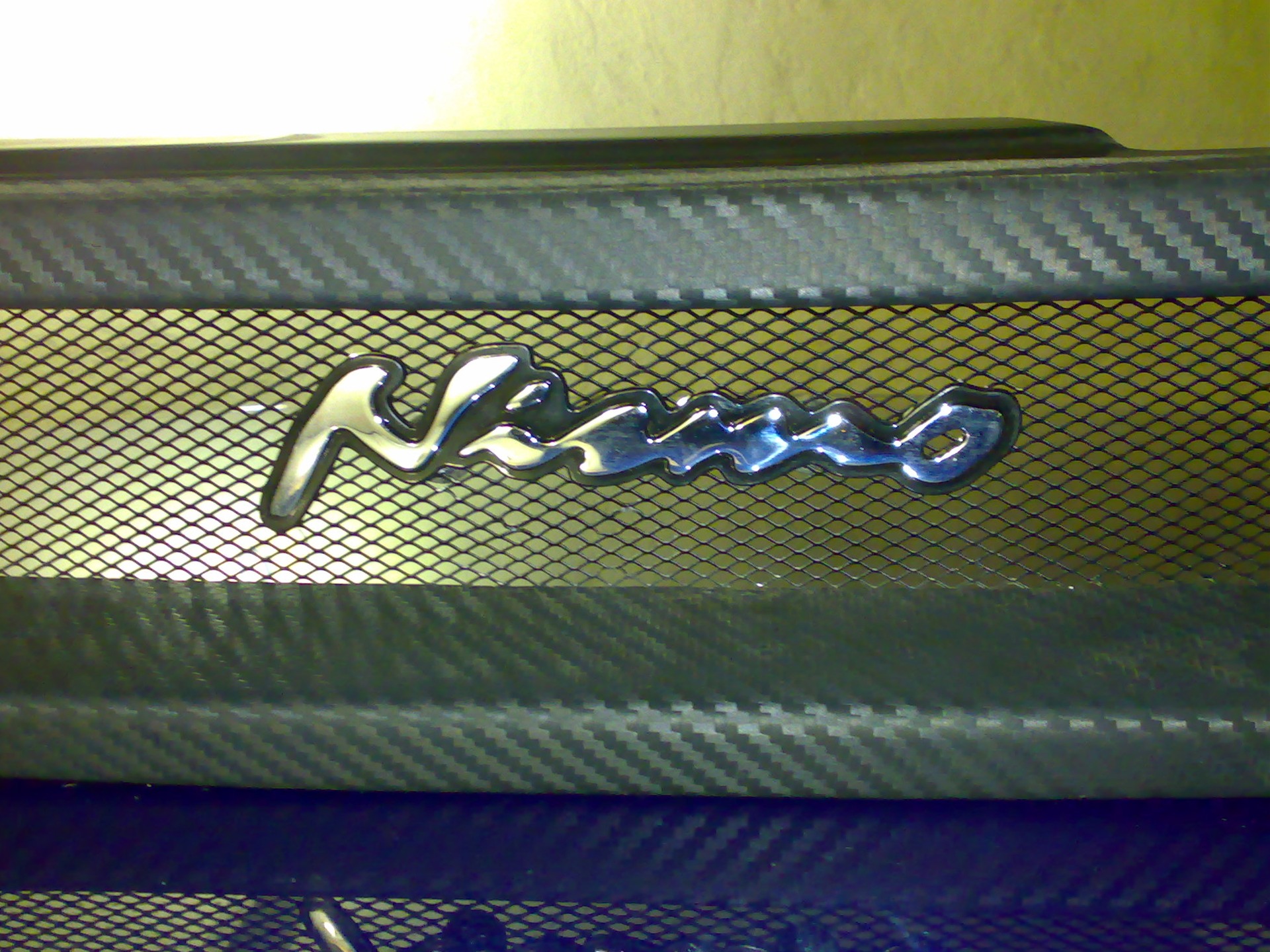 Шильдик NISMO на грати 4