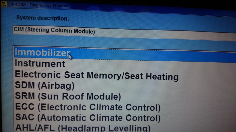 Оригінальний викидний ключ частина 2. Програмування/прив'язка ключа іммобілайзера за допомогою OP-COM 5