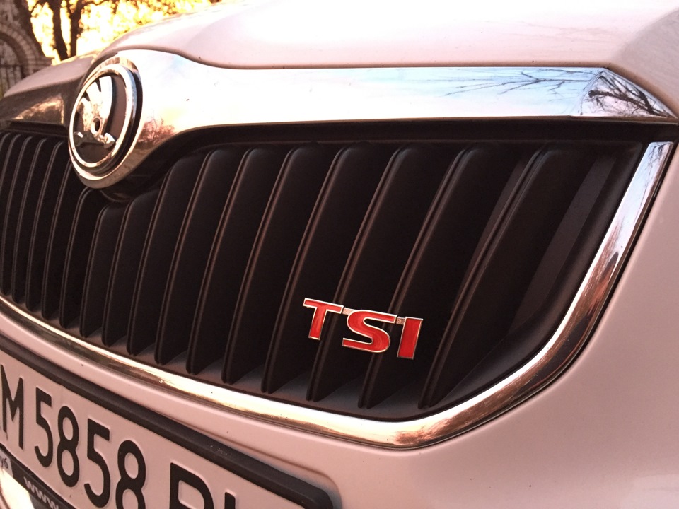 Емблема TSI 1
