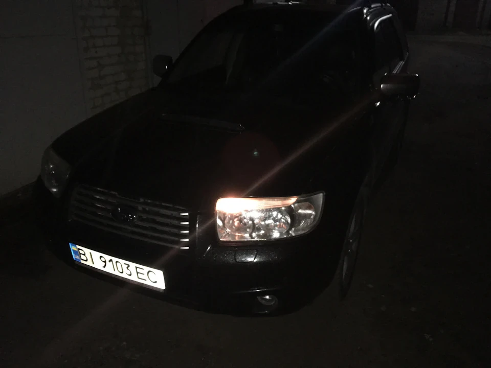 Датчик положення кузова, коректор фар, лампочки в передні габарити