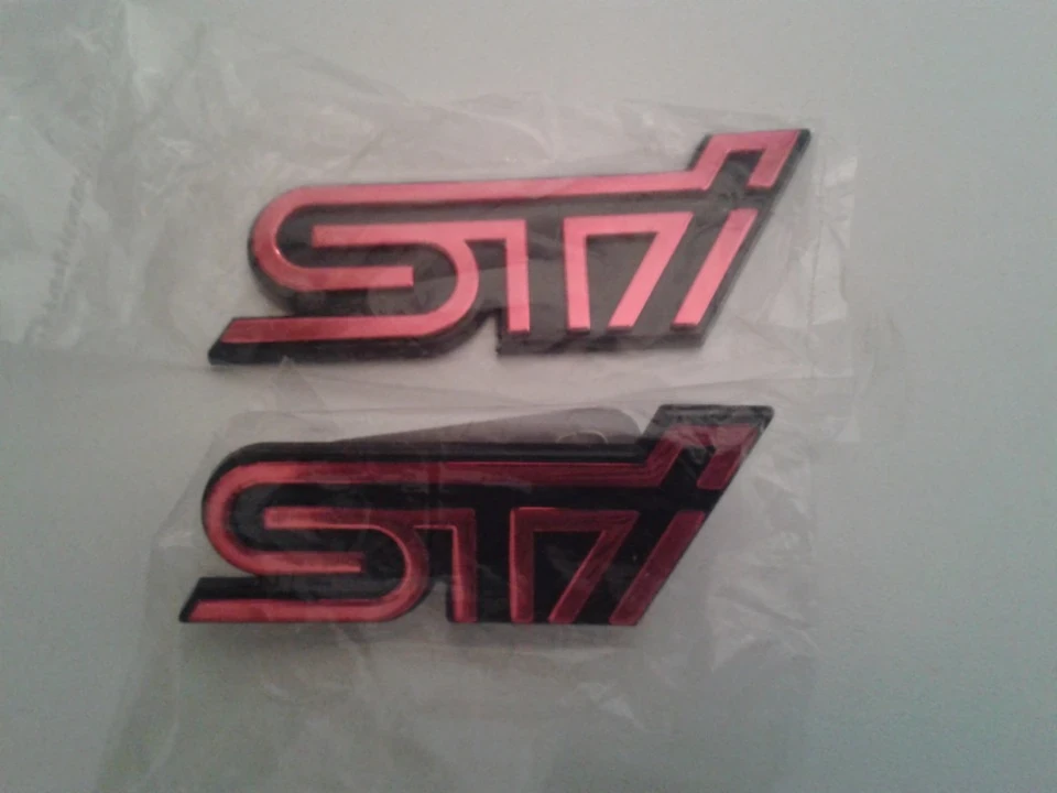 STI_шильдики