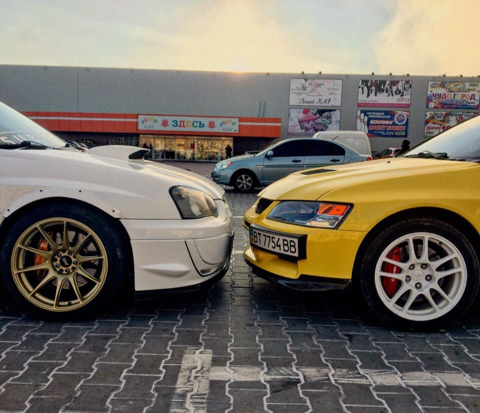 Битва Subaru Impreza WRX STI VS Mitsubishi Lancer Evo