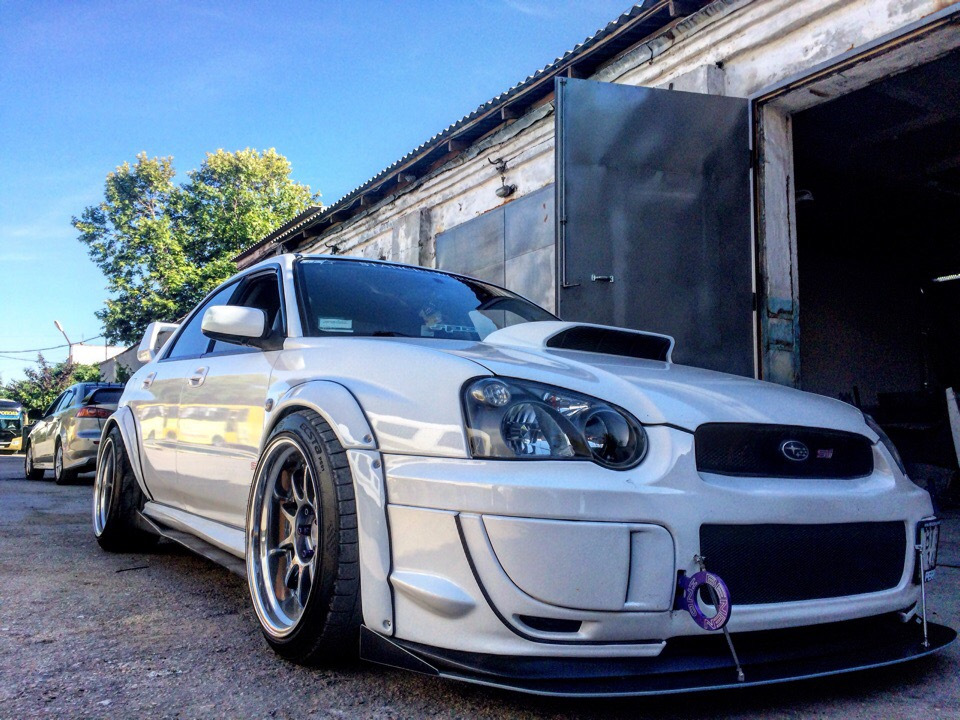 поєднання Tein Super Street та STI 1