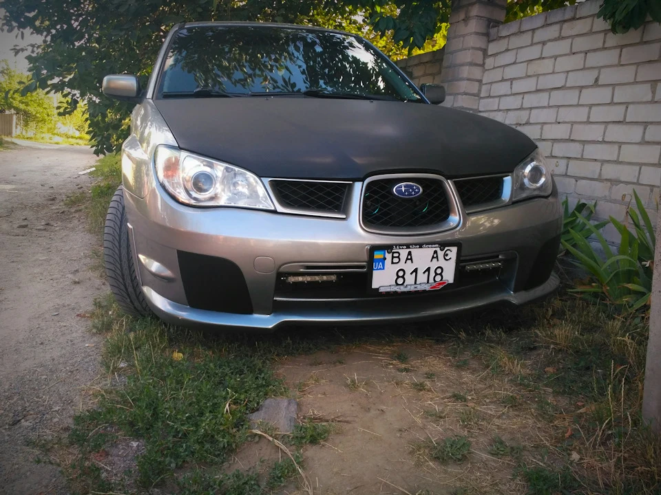 Прикупив рамку для номера
