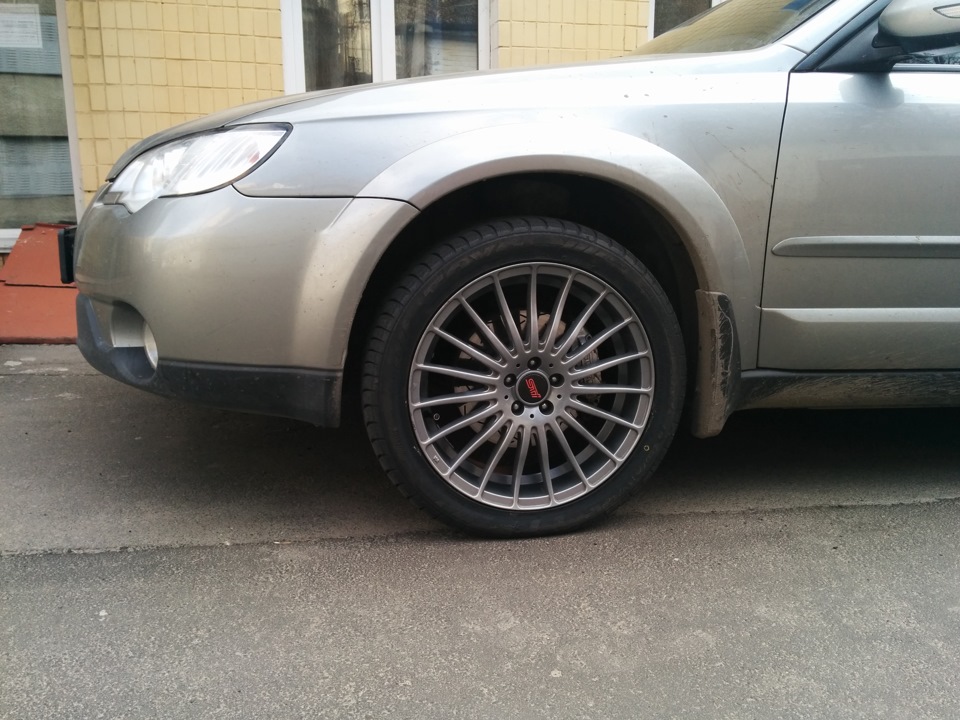 Поставив куплені диски та нову гуму. 3