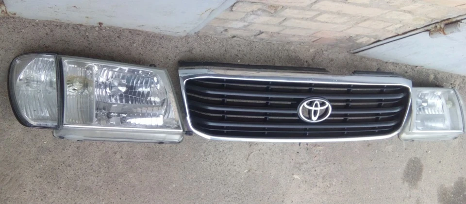 Комплект перед і зад оптики, грати Toyota Land Cruiser 100