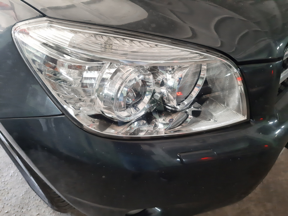 Установка bi led модулів Aozoom A7, полірування фар 4