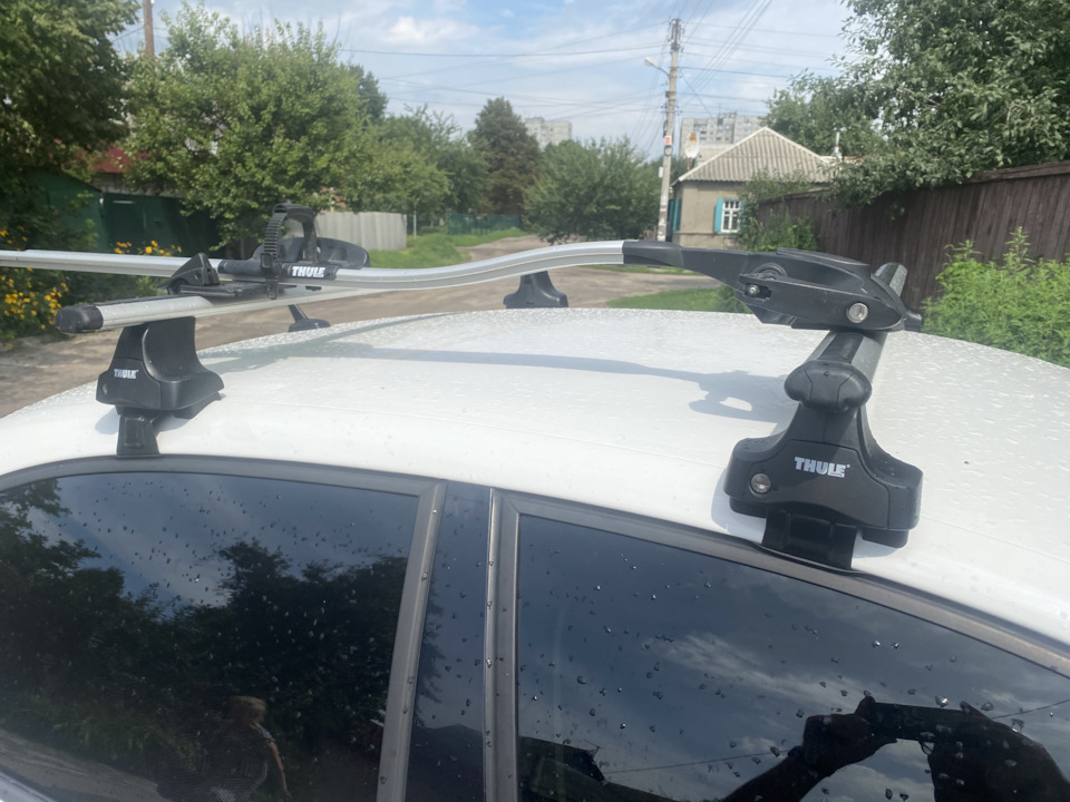 Поперечки Thule та кошик на дах VW JETTA 2