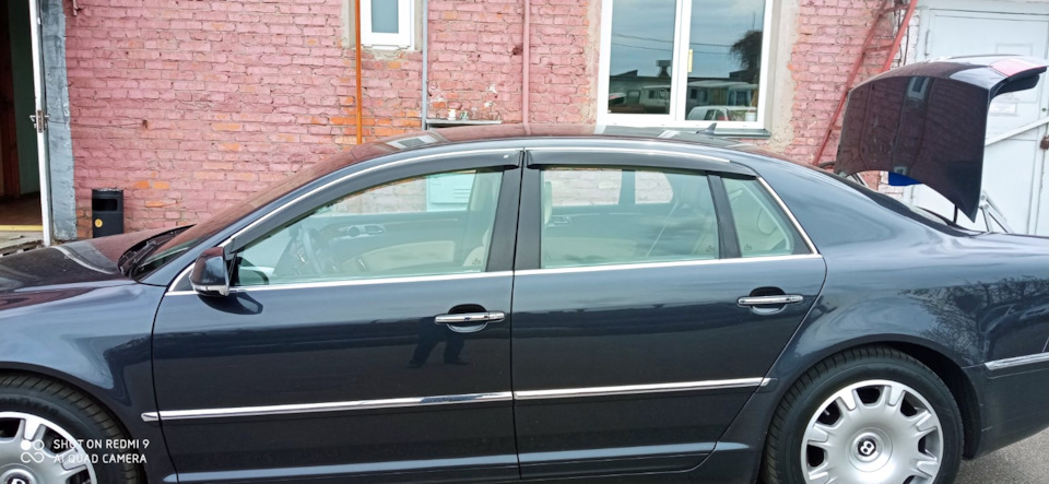 Встановлення вітровиків на VW Phaeton 1