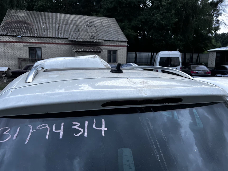 Віяловий обмивач заднього скла. Tiguan 1G