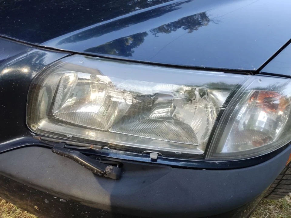 Оригінальний захист фар 9488978. Volvo S80 1999