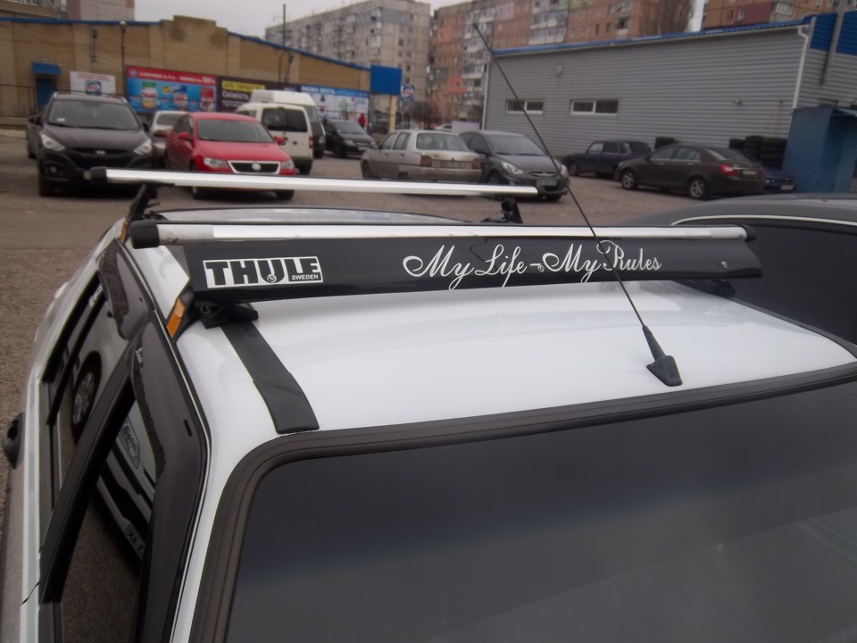 Мийка, наклейка THULE, заміна гуми (Літо) 4
